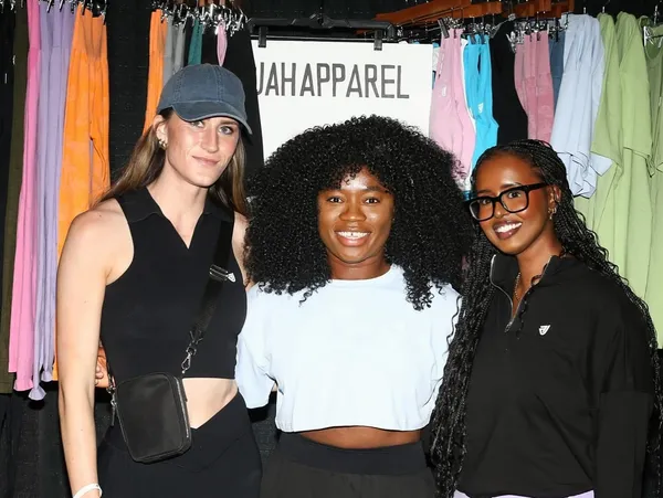 Juah Apparel team at booth